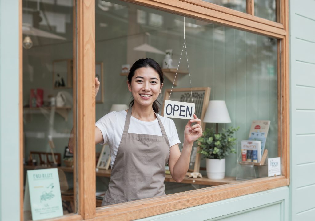 happy-business-owner-opening-her-shop