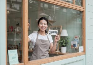 happy-business-owner-opening-her-shop